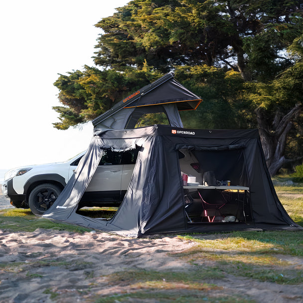 OPENROAD 270 awning side walls combined with a vehicle, creating a cozy camping setup with outdoor dining.