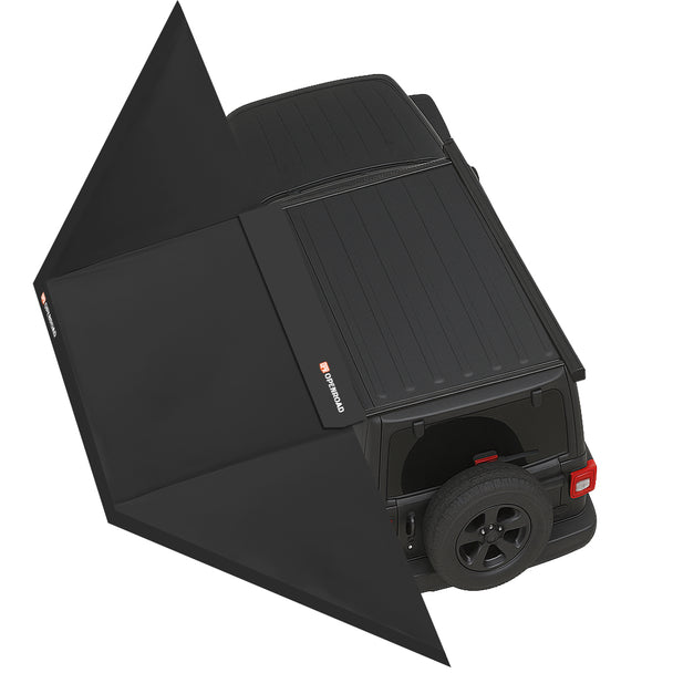 Overhead view of a black Jeep fitted with the OpenRoad 180 awning partially deployed from its roof rack