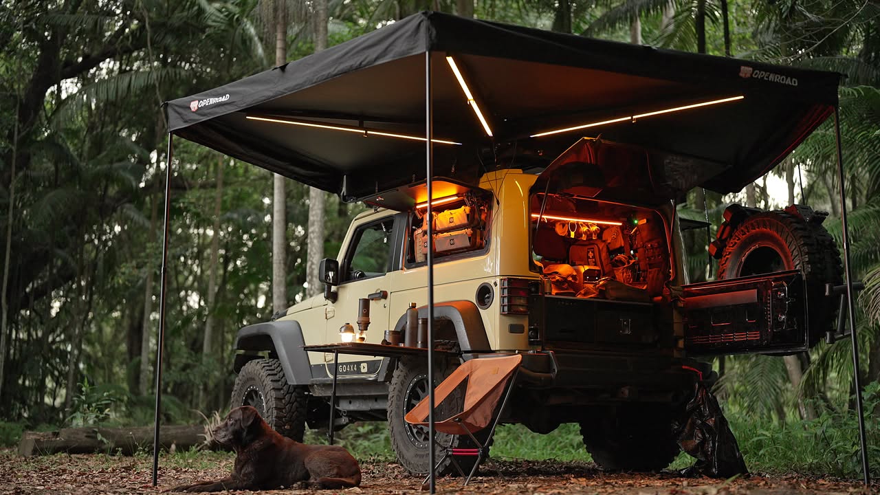 Jeep Wrangler JK with OPENROAD 270° awning and LED lighting—wrap-around bush camp shade