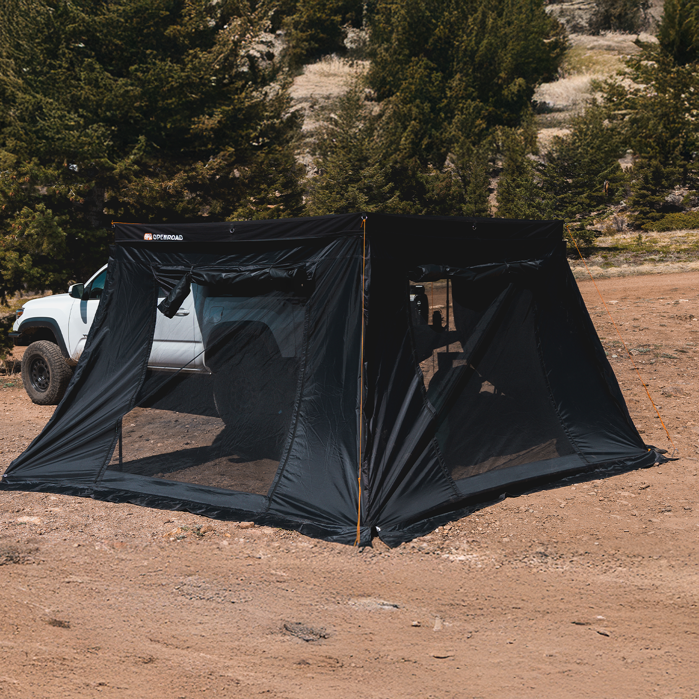 OPENROAD 270 free standing awning set up at a campsite, providing shade, weather protection, and a comfortable outdoor space for family and friends.