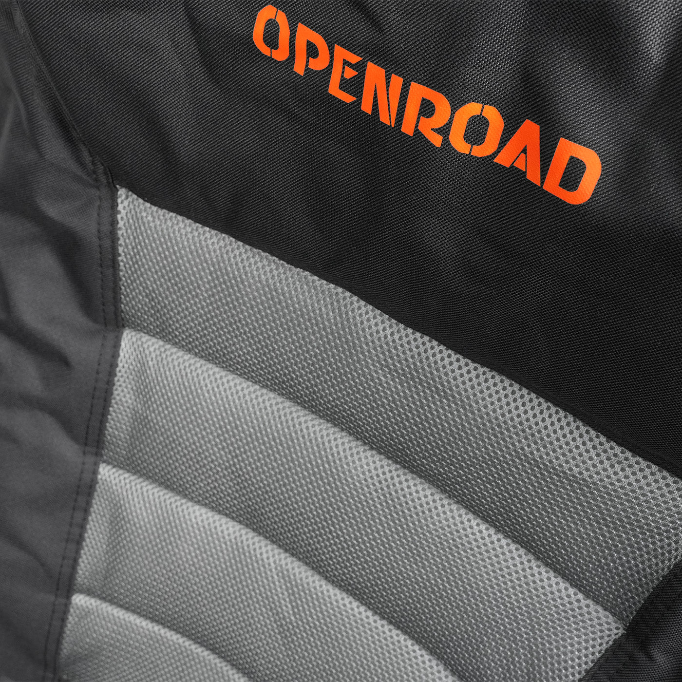 Close-up of Openroad camp chair mesh backrest and padded stitching, showing breathable comfort and brand detail.