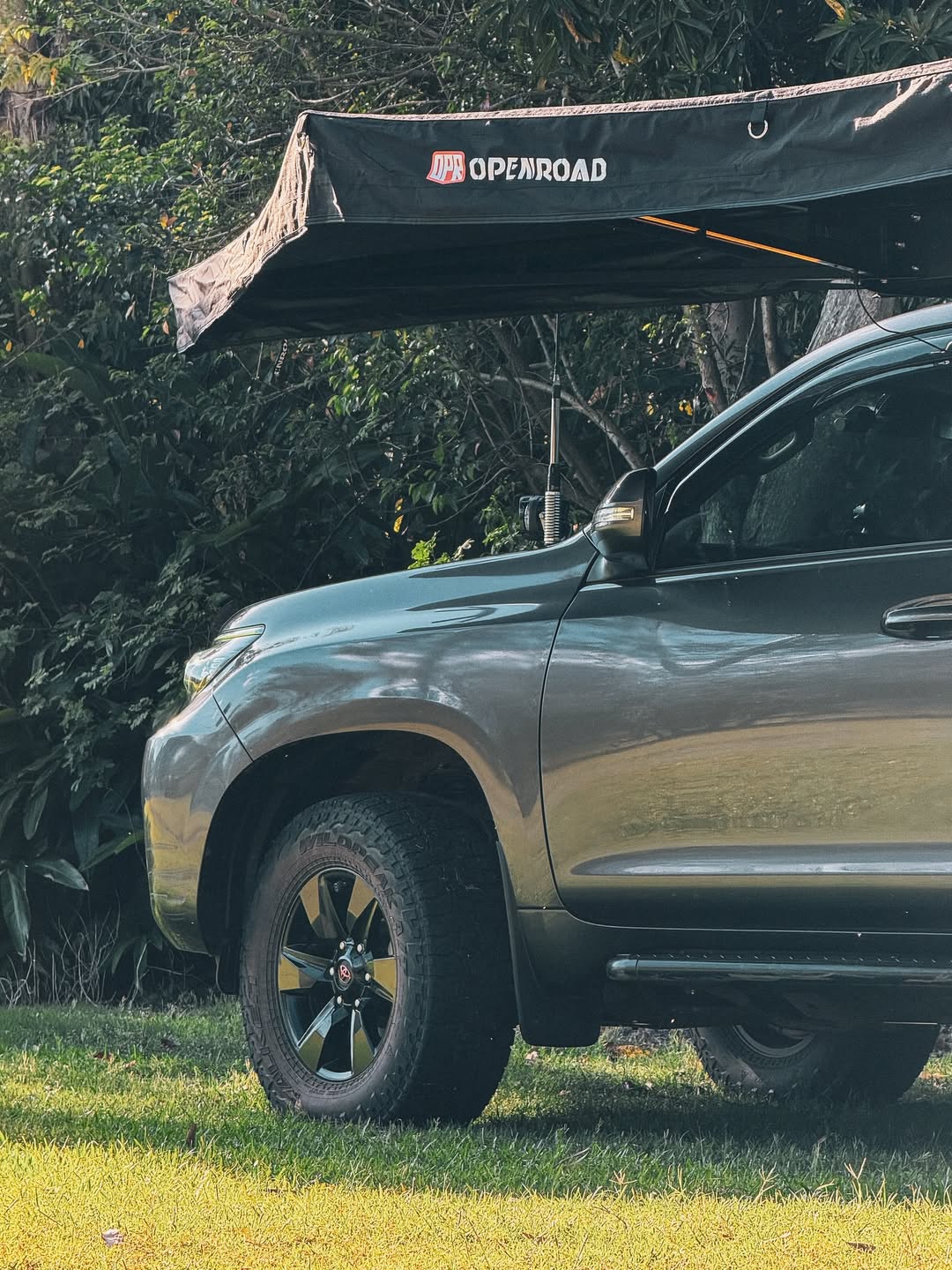 Toyota Prado 150 fitted with OPENROAD 2.0m awning for car, showing front section and sturdy roof mount