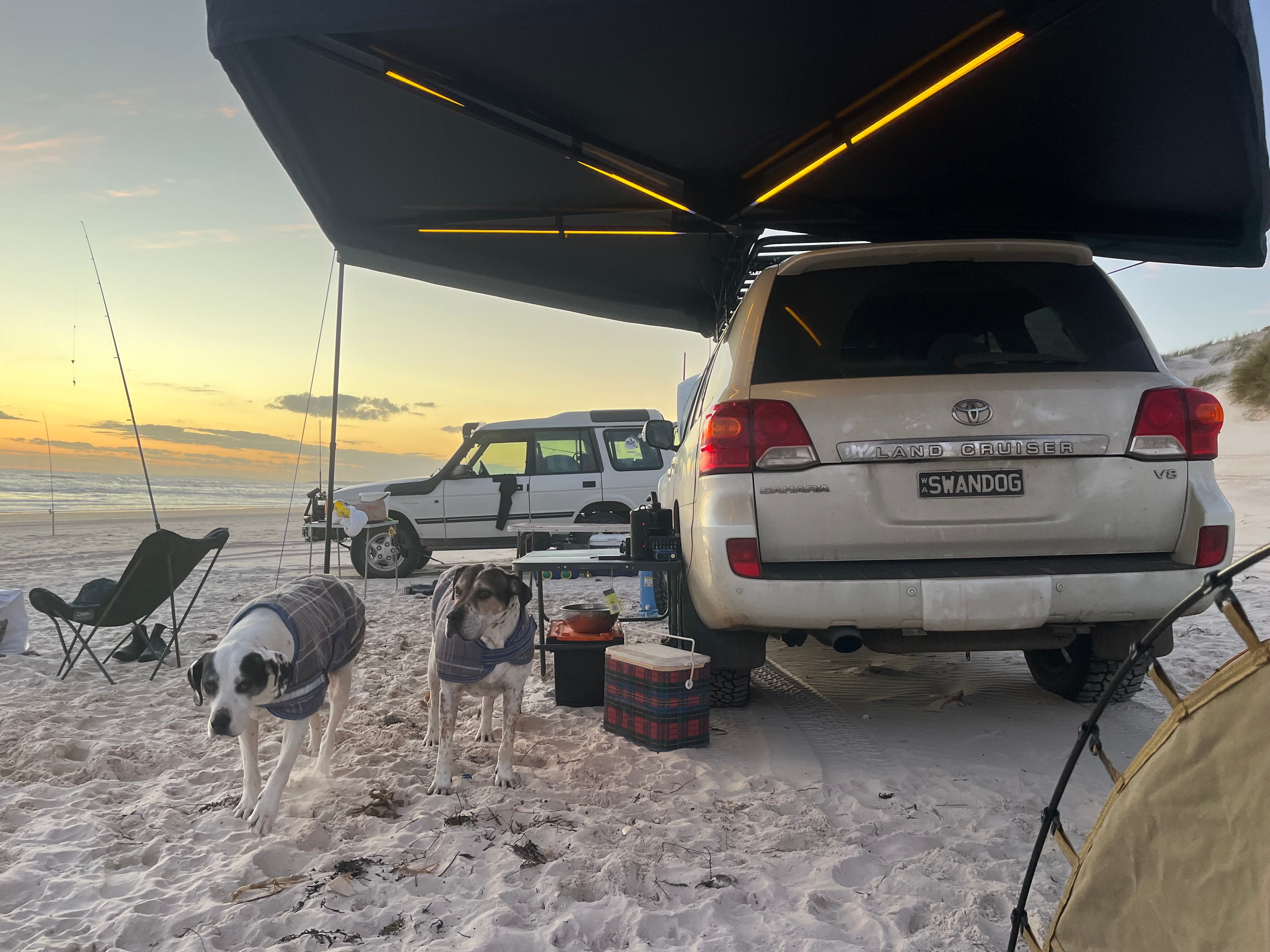 270 degree awning providing shade at the beach behind a Toyota LandCruiser 200 Series