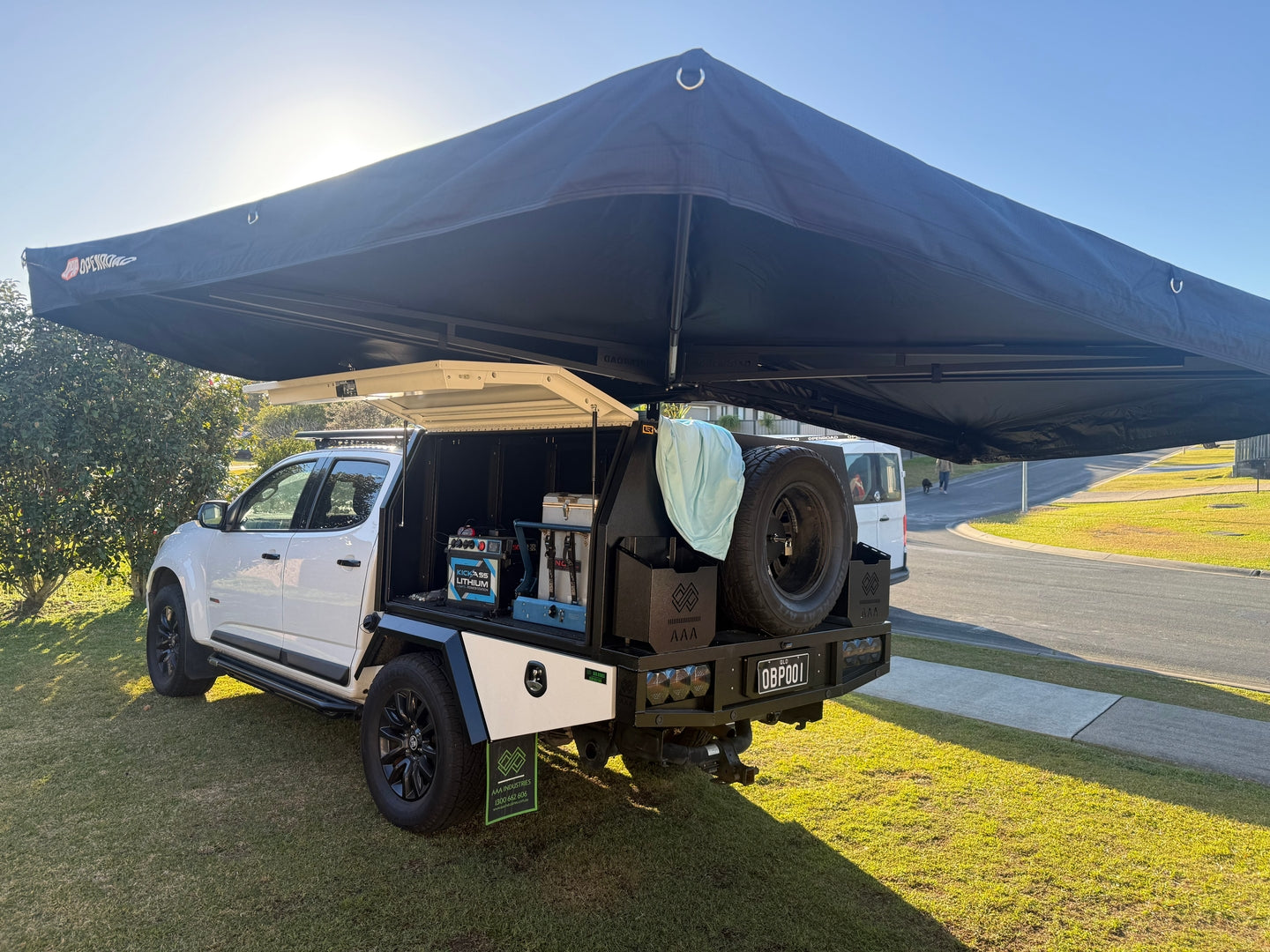 Mazda BT-50 using a freestanding 270 awning extended over the rear canopy area for 4WD outdoor cooking and camping.