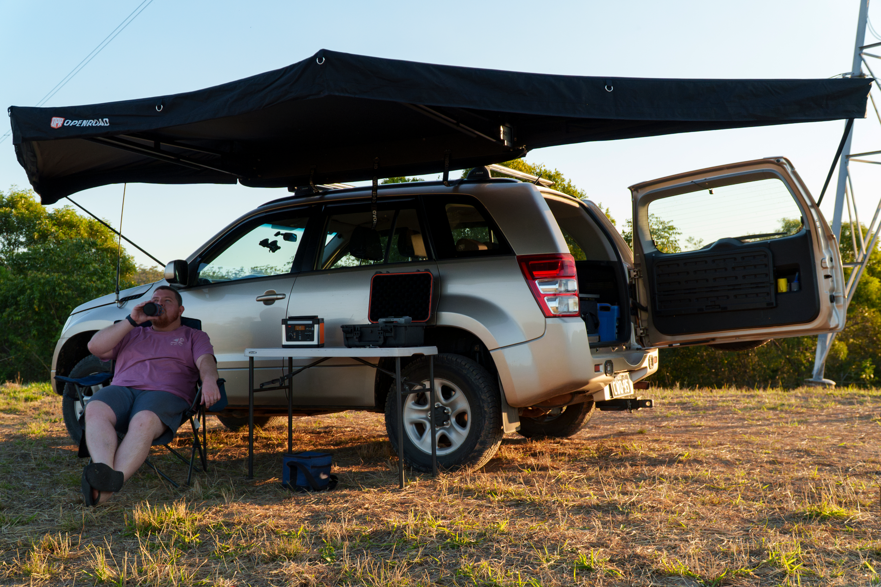 Openroad 180 car awning on a Suzuki 4WD roof rack, quick-fold side shade for off-road camping in Australia.
