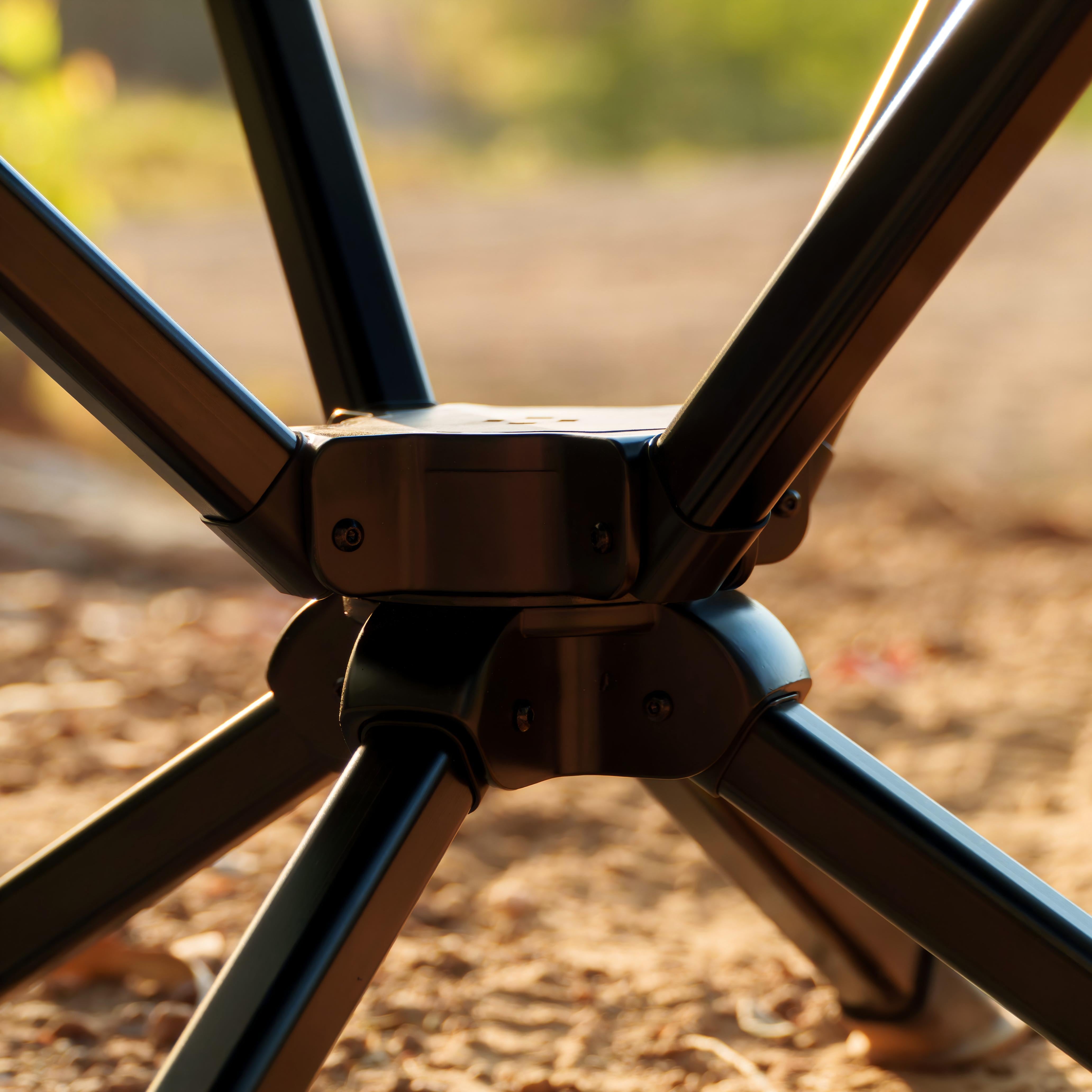 OPENROAD ergonomic camping chair swivel base, close-up of reinforced aluminium alloy hub and legs for stable support