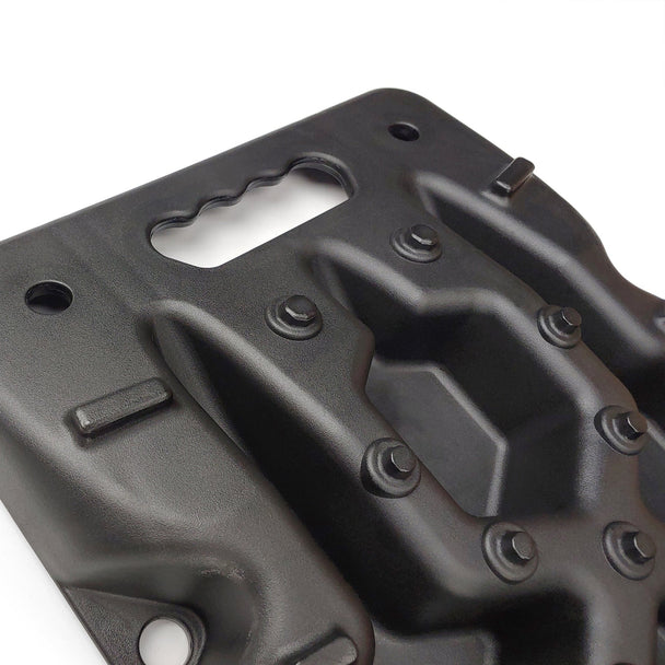 Close-up of Openroad recovery board featuring ergonomic carry handle and aggressive traction spikes for superior tire grip