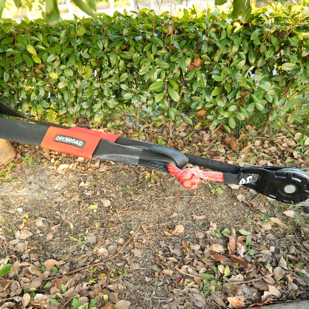 Openroad tree trunk protector rigged to tree with soft shackle and snatch block for safe vehicle recovery