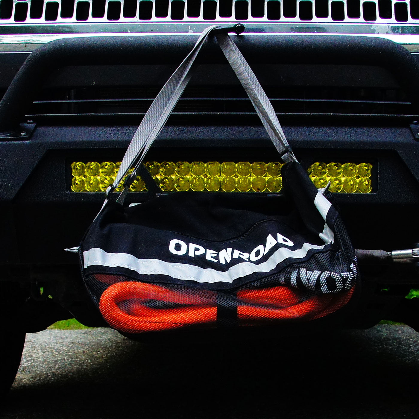 OPENROAD strap towing bag with snatch strap mounted on 4x4 vehicle front bumper